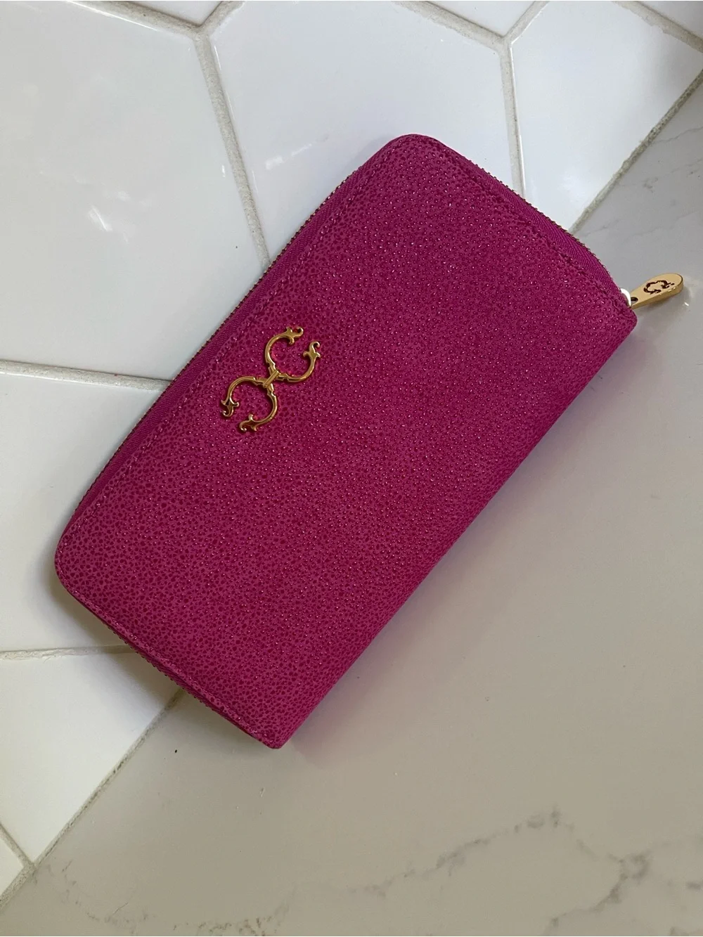 C. Wonder Fuchsia Zip-Around Wallet with Gold Logo